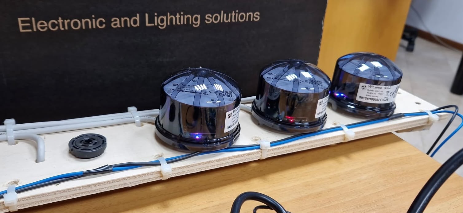 Three iLCS luminaire nodes on a demonstration lighting rail